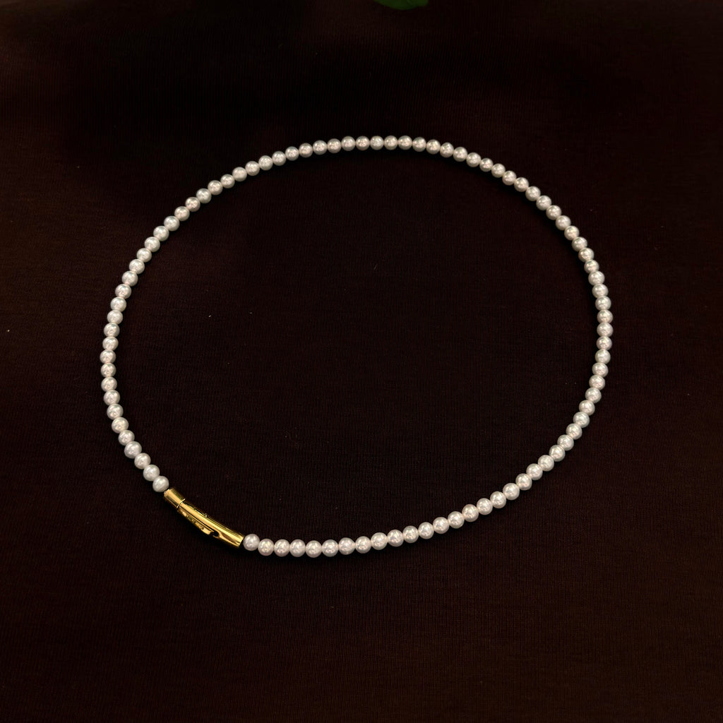 3.5 mm bright white freshwater pearl necklace, 42 cm long.