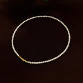 3.5 mm bright white freshwater pearl necklace, 42 cm long.