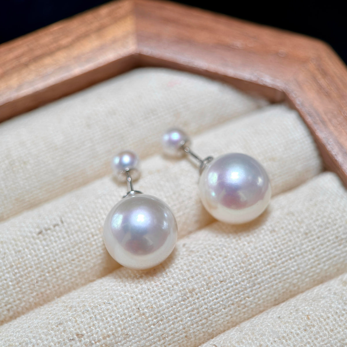 
White freshwater pearl convertible earrings featuring bright 10 mm larger pearls.
