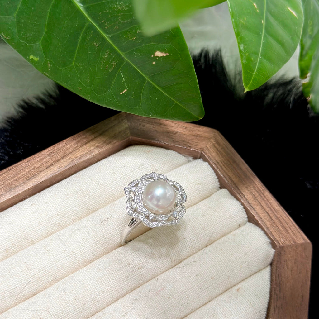 Close-up of a round 10 mm freshwater pearl with exceptionally reflective lustre.