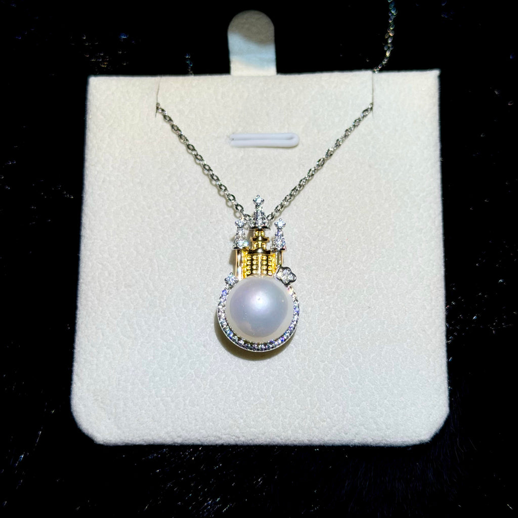 Sterling silver castle pearl necklace styled for elegant evening wear.