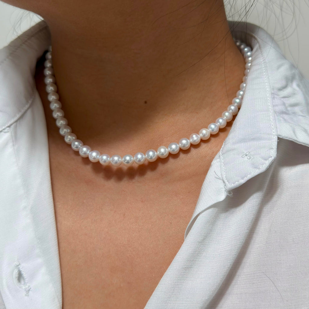 Natural pearl necklace showing subtle individual pearl variation.