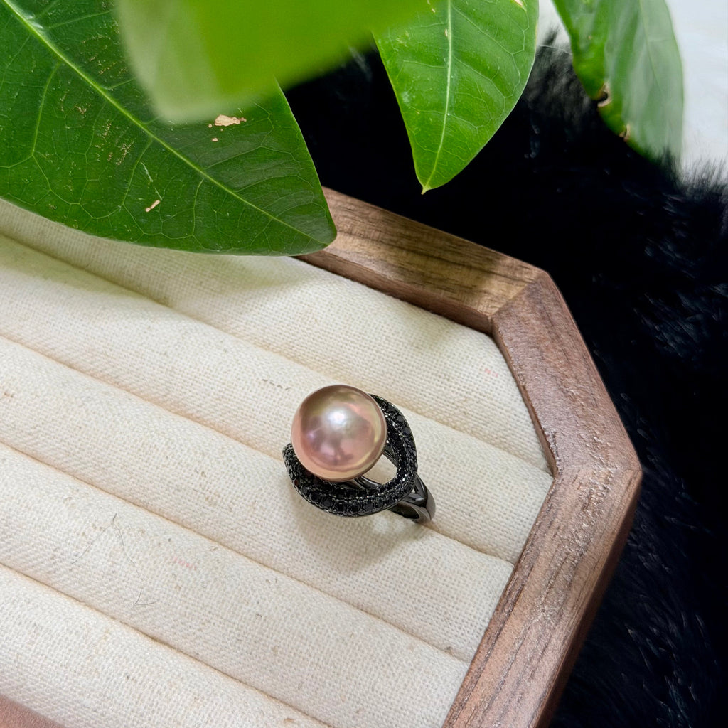 Large reddish-brown natural freshwater pearl ring.