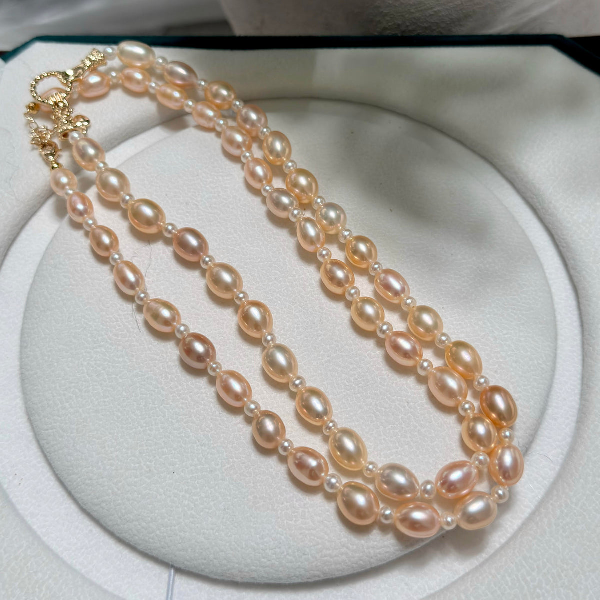 Oval freshwater pearl necklace with bright high-lustre surfaces.