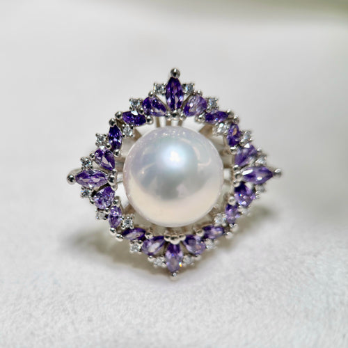 11.4 mm white freshwater pearl ring with purple zirconia floral halo.