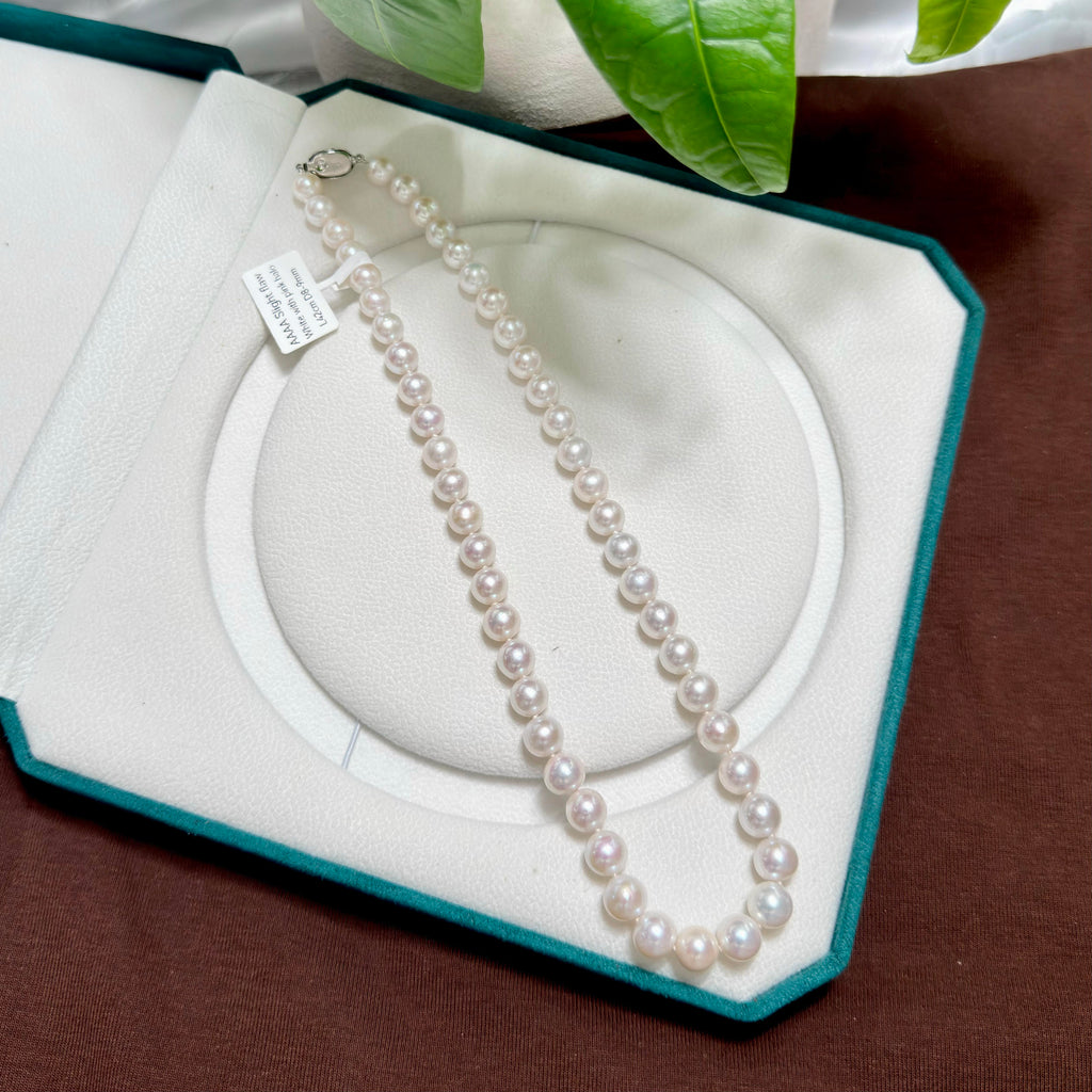 Natural freshwater pearls showing very high lustre and round shape.
