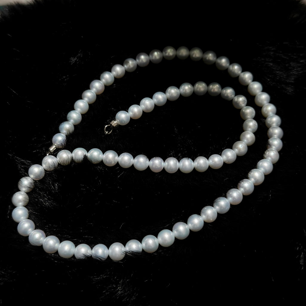 Modern 5.5–6 mm freshwater pearl necklace with a luminous icy-blue overtone.