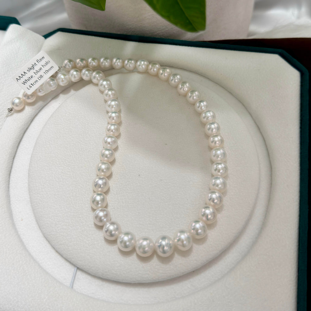 Natural freshwater pearls showing bright cool-toned lustre and near-round shape.
