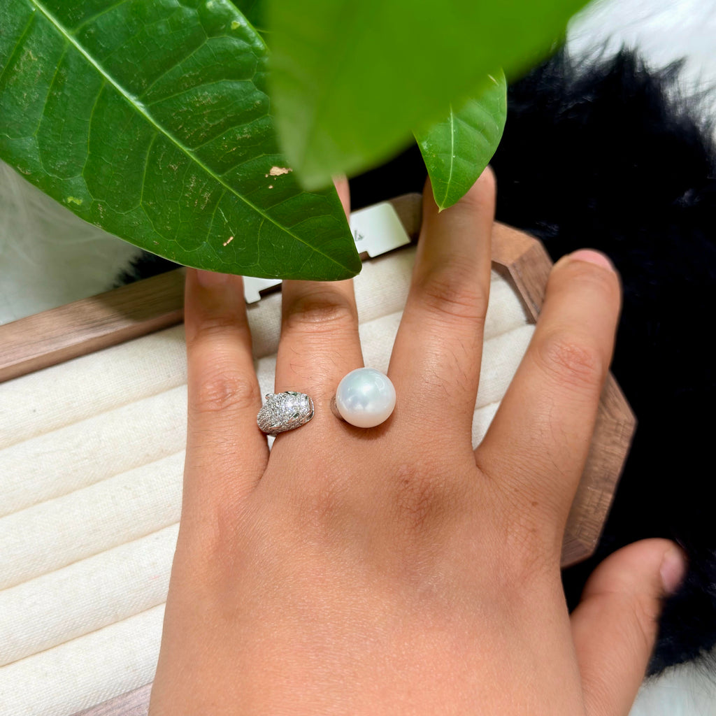 White pearl open-band ring in sterling silver.