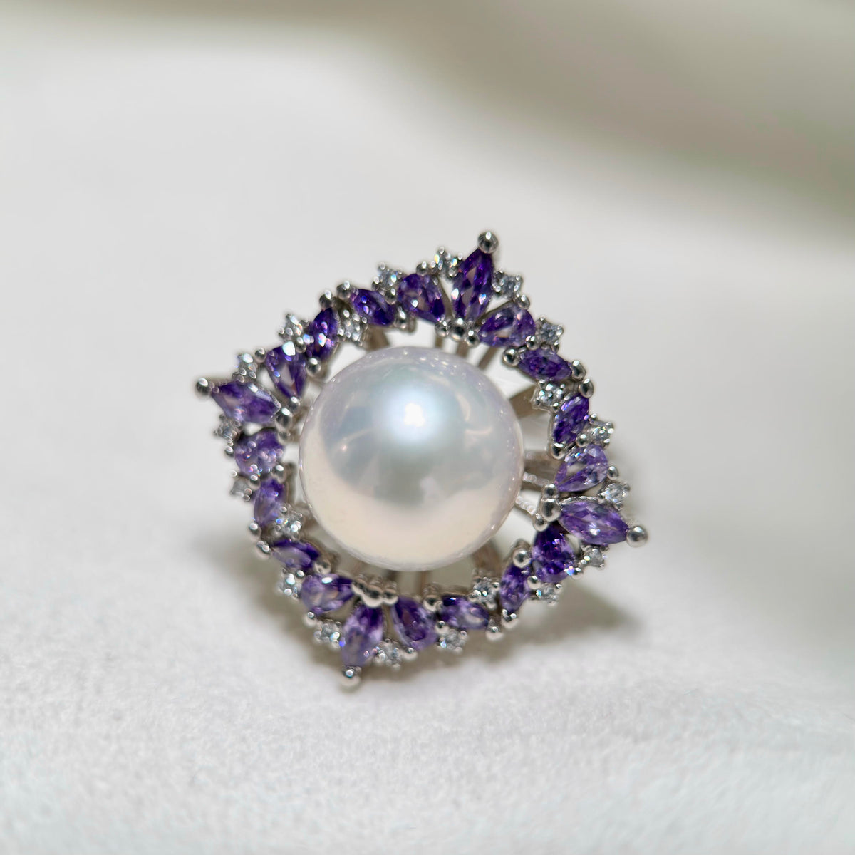 Romantic violet-inspired pearl statement ring in sterling silver.