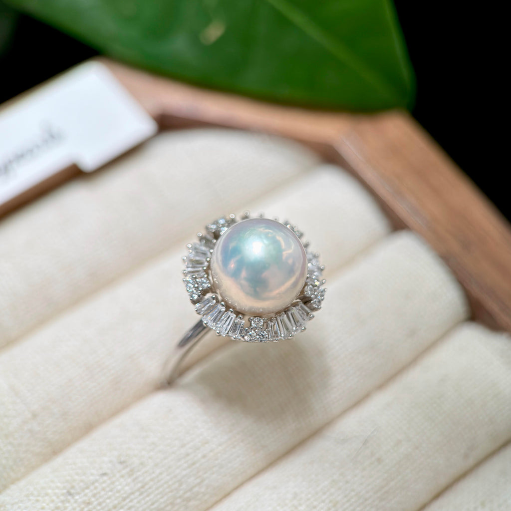 10.3 mm freshwater pearl ring with cool blue iridescent overtones.