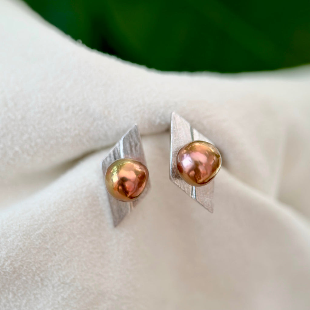 Modernist geometric 7.5 mm baroque freshwater pearl stud earrings in brushed sterling silver.

