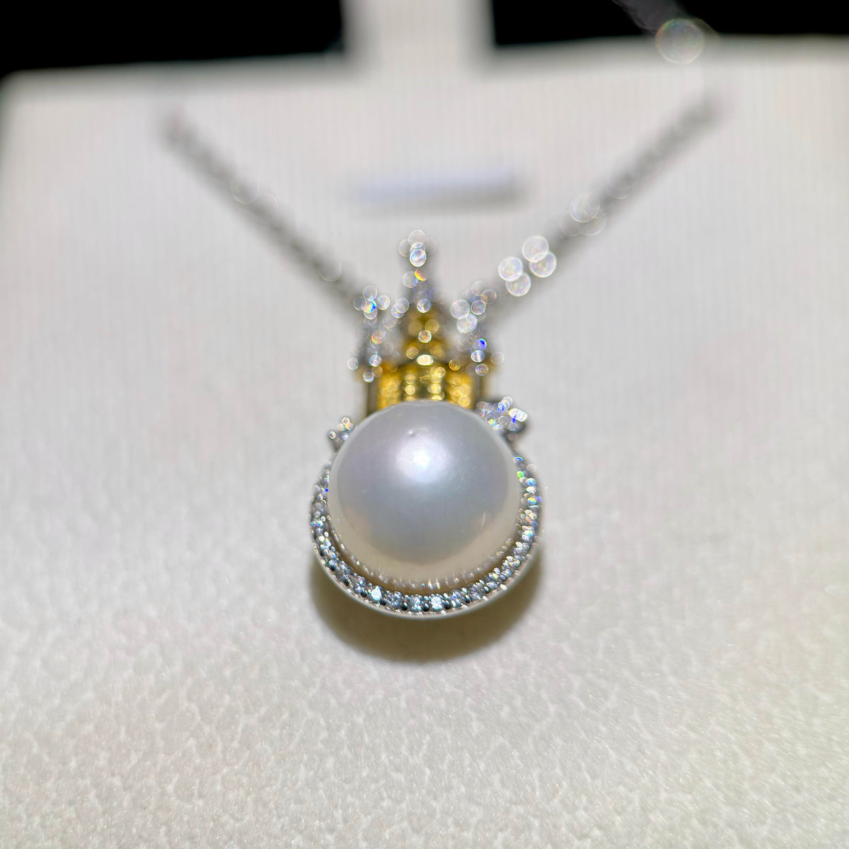 Romantic white pearl castle necklace with an elegant princess-inspired design.