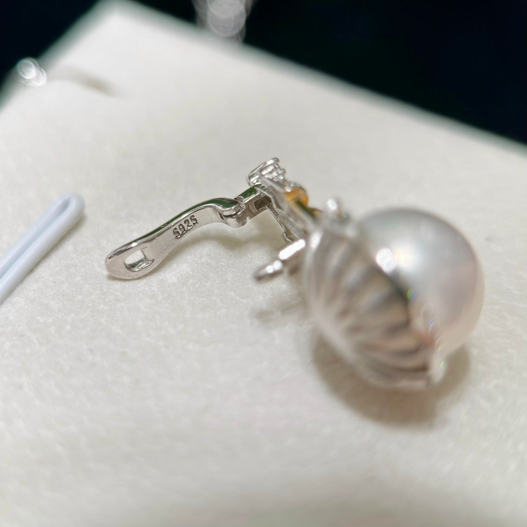 Fairytale pearl pendant featuring a versatile sterling silver universal bail.