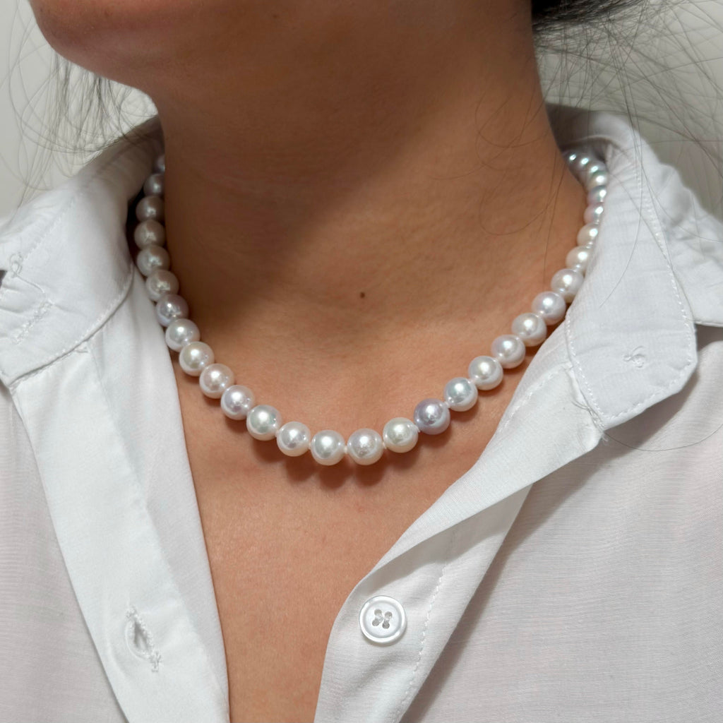 Natural pearl necklace showing subtle individual pearl variation.
Detailed strand view of the N-000246 freshwater pearl necklace.