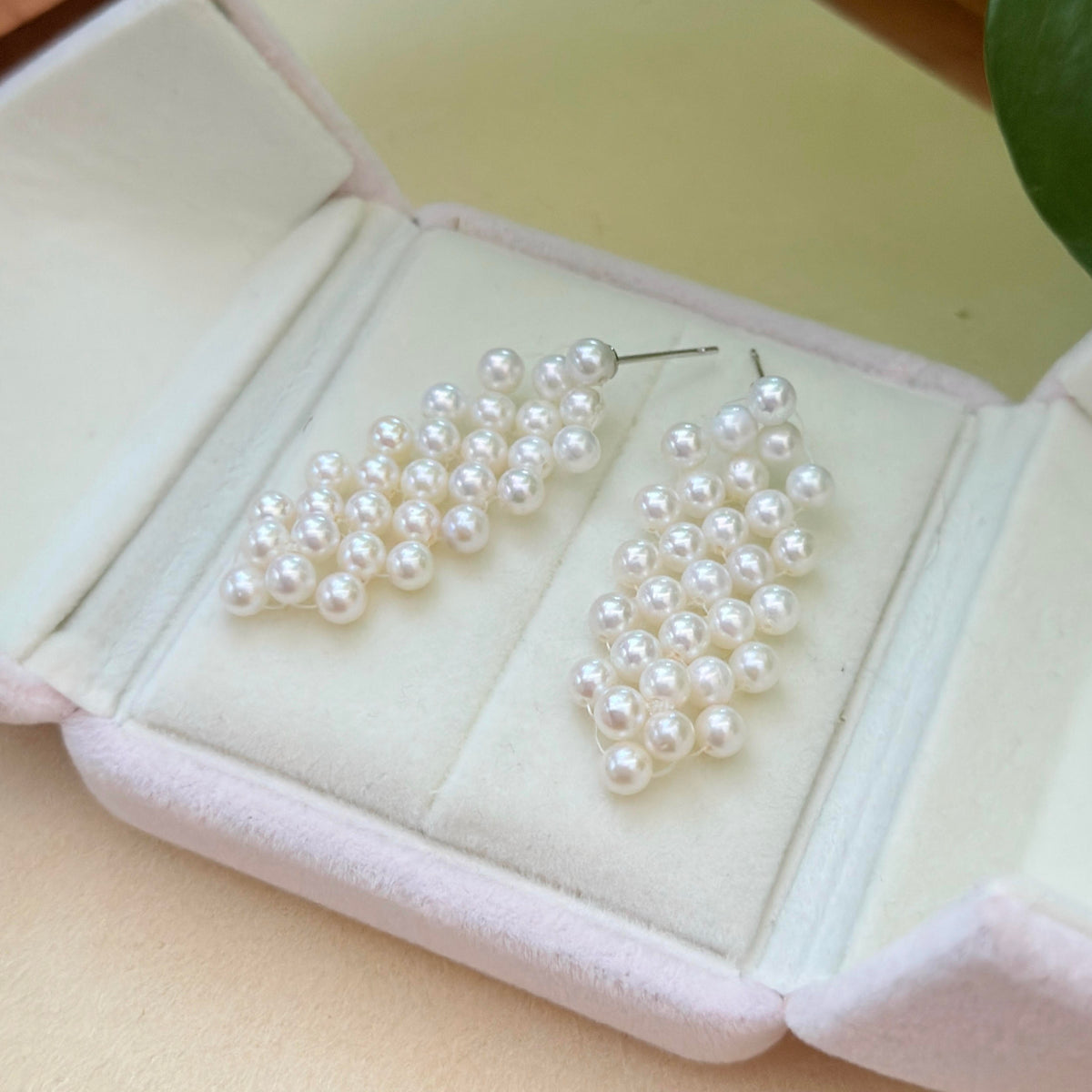 Sterling silver pearl drop earrings with bright natural lustre.