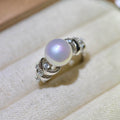 10 mm white freshwater pearl princess ring with blue and pink halo.