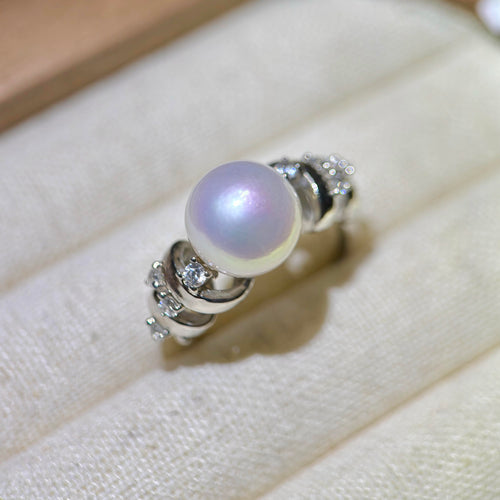 10 mm white freshwater pearl princess ring with blue and pink halo.