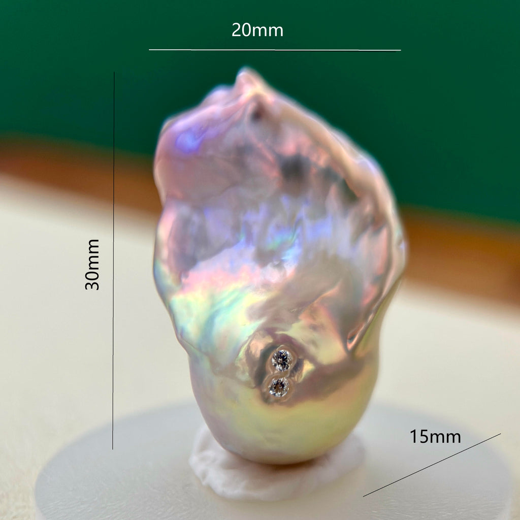 A baroque pearl earring with two small round diamonds, shown with dimension lines indicating 30mm height, 20mm width, and 15mm depth, on a white display stand.