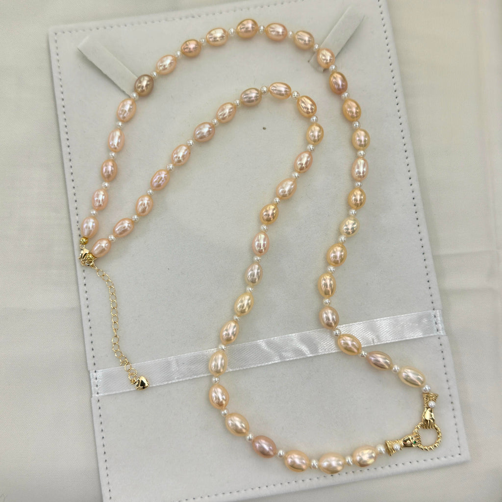Natural golden-orange freshwater pearl necklace with bright lustre.