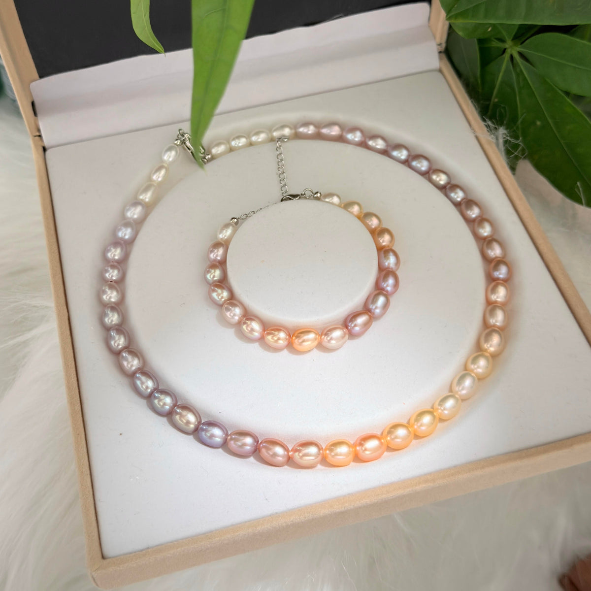 Romantic necklace and bracelet set made with 8–9 mm multicolor freshwater pearls.