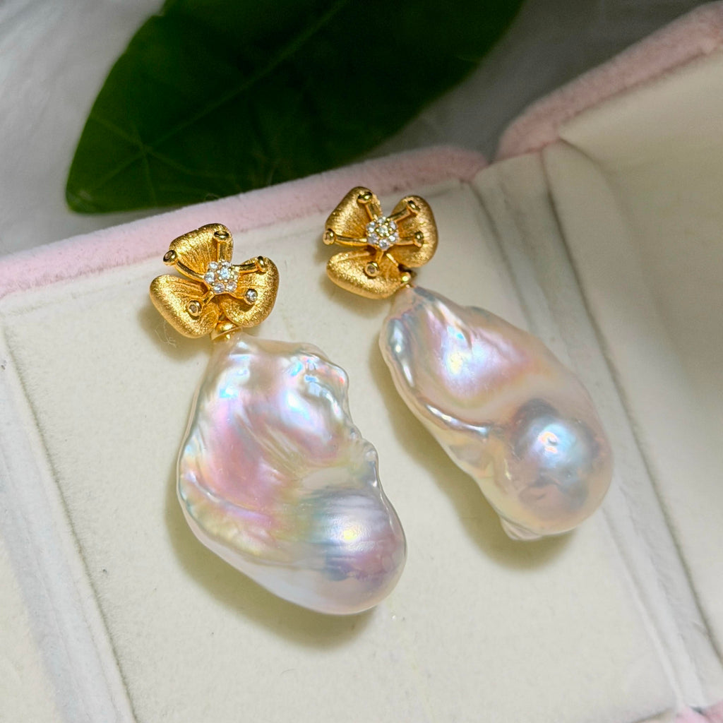 large freshwater pearl earrings with a convertible two-in-one design.
