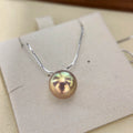 13.2 mm multicolor freshwater pearl necklace on a sterling silver snake-bone chain.