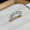 Dainty pearl ring featuring flawless round freshwater pearls.