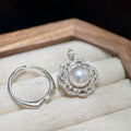 Sterling silver camellia flower jewelry designed to be worn as a ring or pendant.