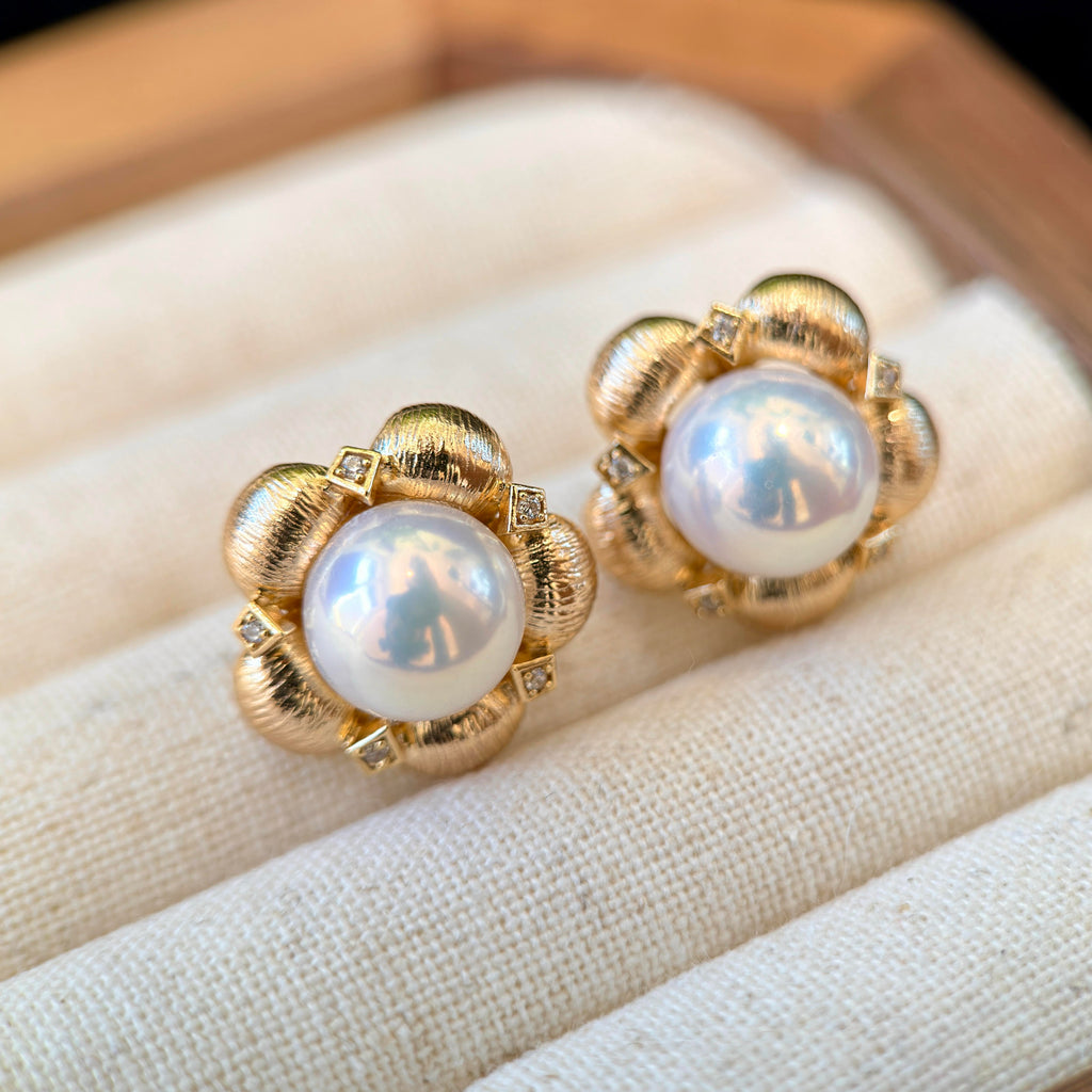 Flawless white freshwater pearl earrings with vintage design.