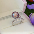 
Mirror-luster freshwater pearl ring in a rich deep purple tone.