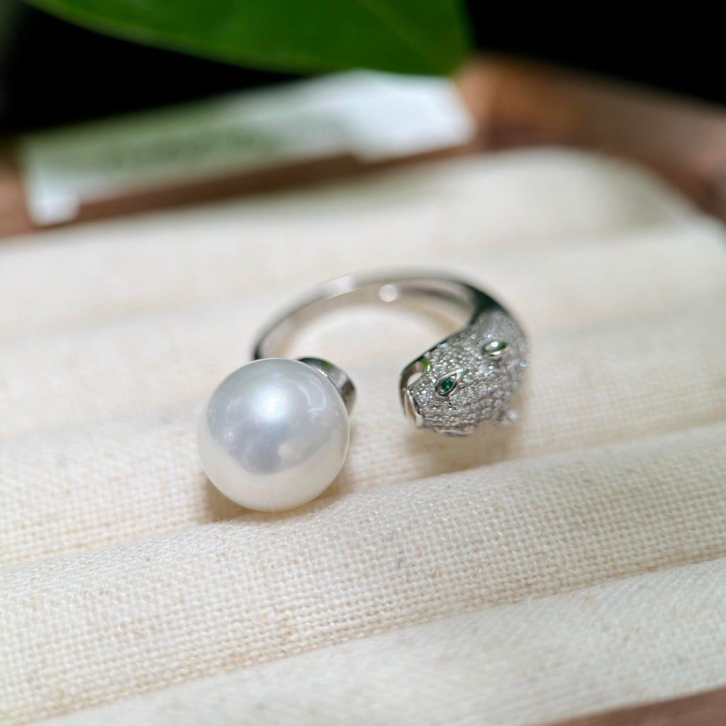 Adjustable 11.4 mm freshwater pearl ring in sterling silver.