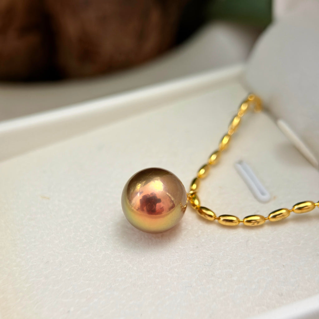 Multicolor freshwater pearl necklace styled for romantic evening wear.