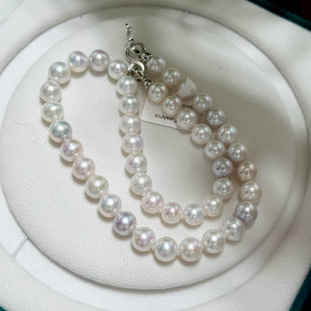 Freshwater pearl necklace showing natural colour and lustre variation.
