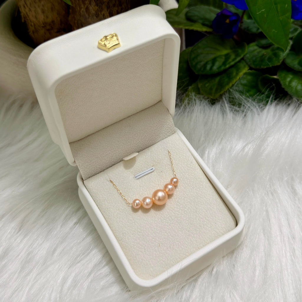 Sterling silver golden-orange pearl necklace designed as a gift for her.