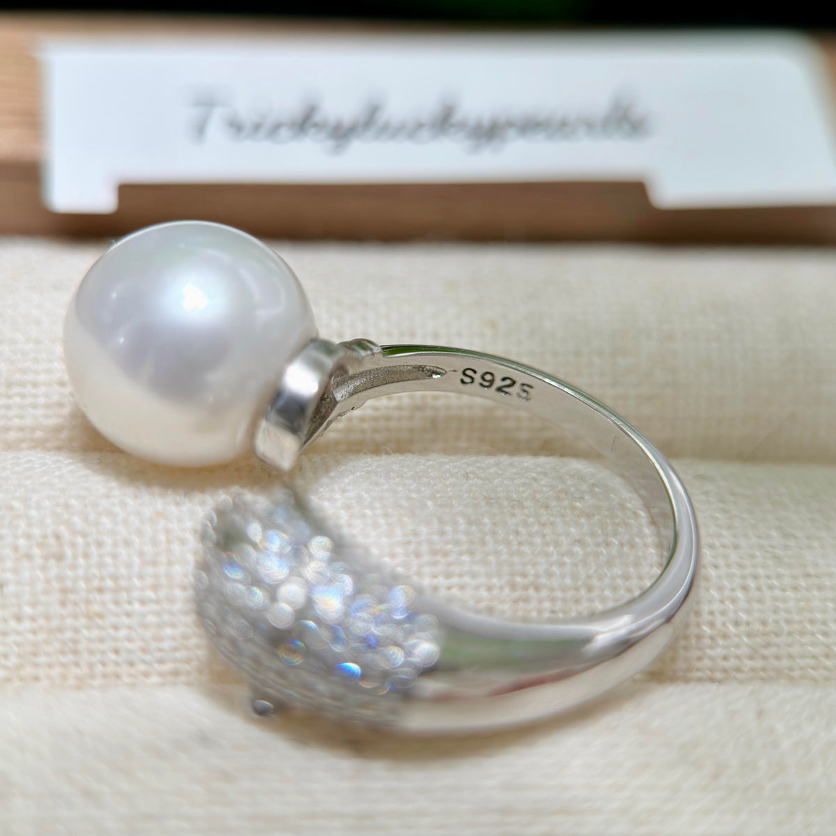 Sterling silver animal ring with natural white pearl.