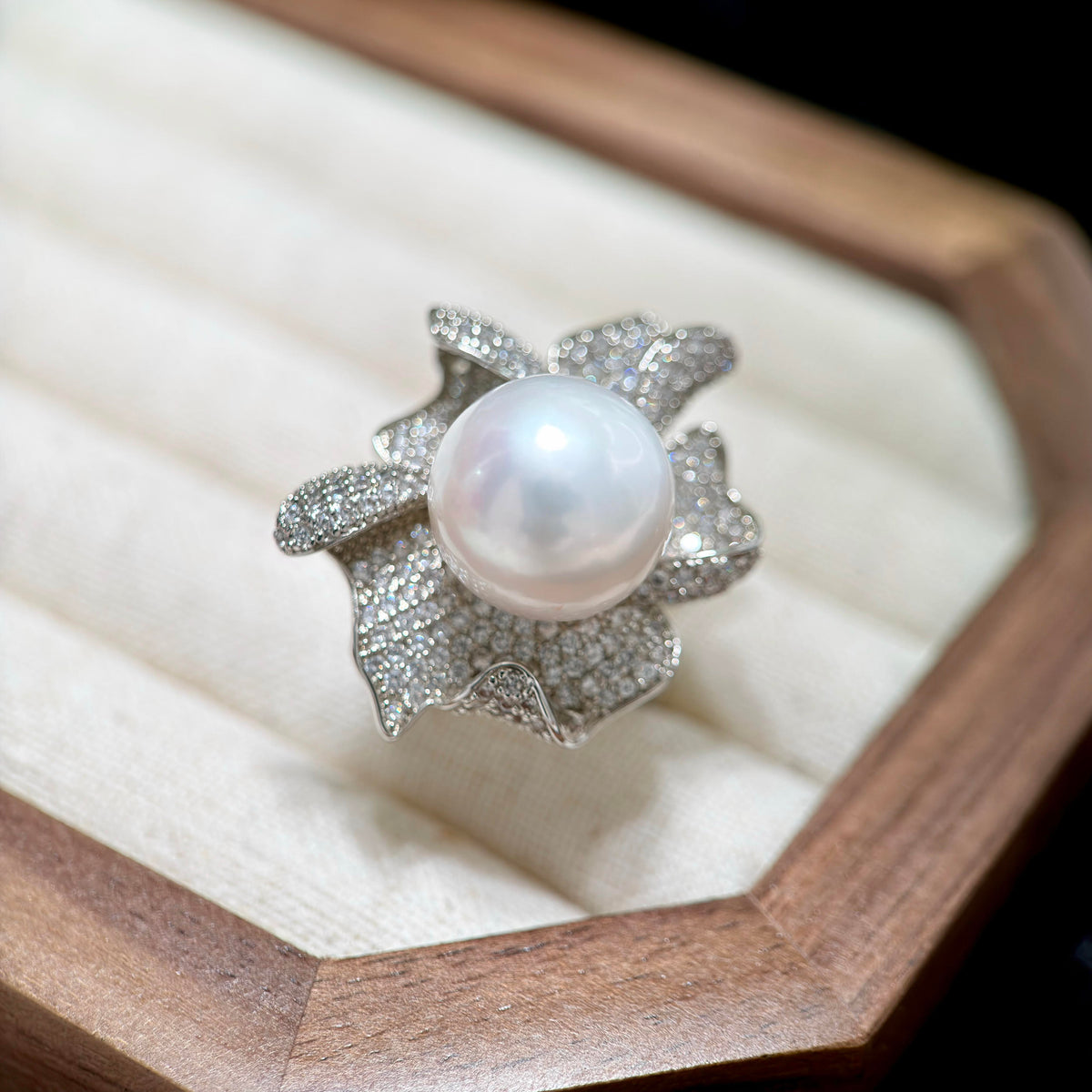 13.7 mm white freshwater pearl flower ring with soft pink overtone.