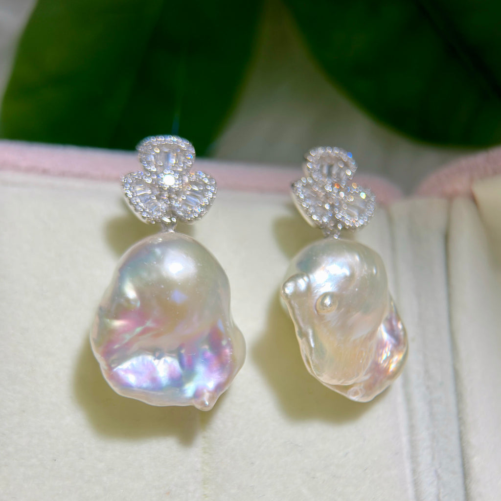 Large white baroque freshwater pearl drop earrings.