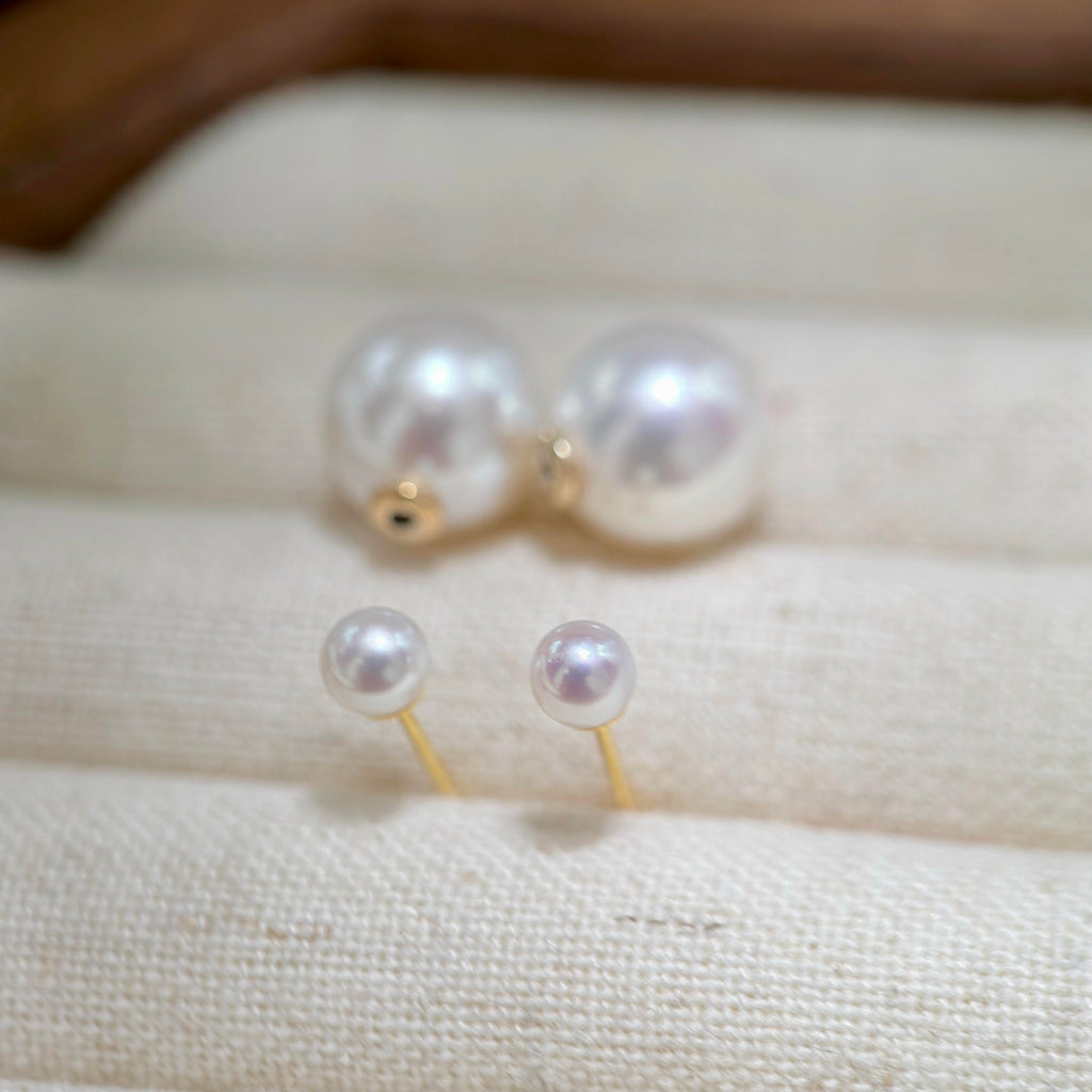 Detachable pearl earrings with 5 mm pearl studs and larger removable pearl backs.