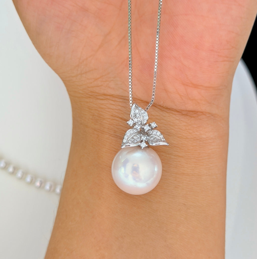 Pink-halo freshwater pearl necklace styled for wedding jewelry.