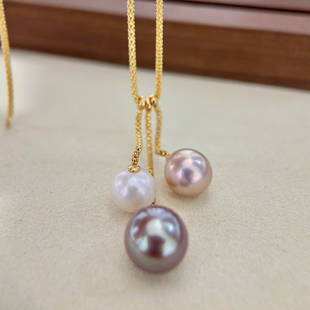 Pink freshwater pearl with green halo styled for evening jewelry.
