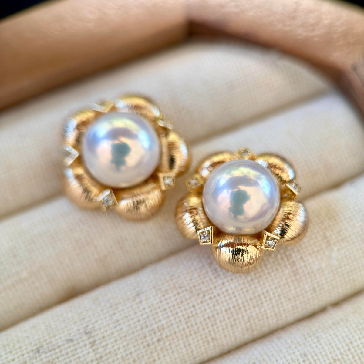 Vintage floral earrings with 10 mm white freshwater pearls.