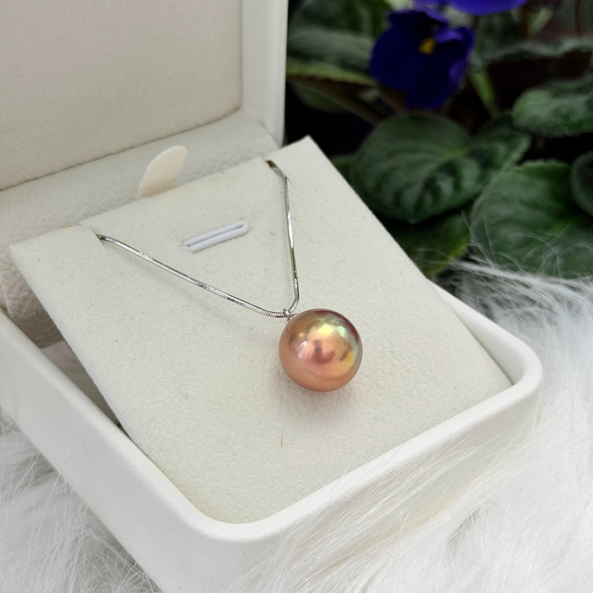 Close-up of a 13.2 mm colour-shifting freshwater pearl necklace.