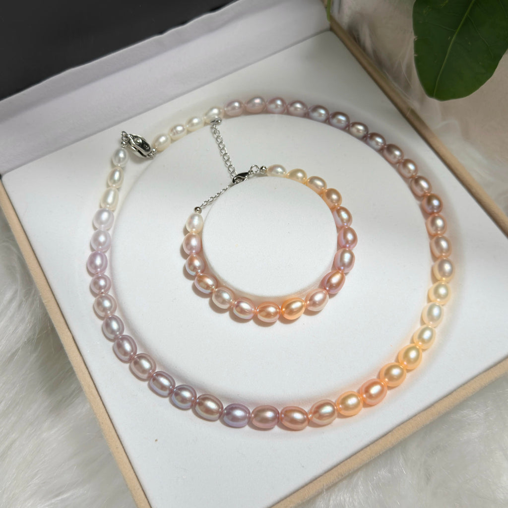 Natural multicolor freshwater pearl jewelry set with matching necklace and bracelet.