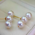 Balance Beam Pearl Stud Earrings – Three 8.5mm White Pearls with Pink Halo