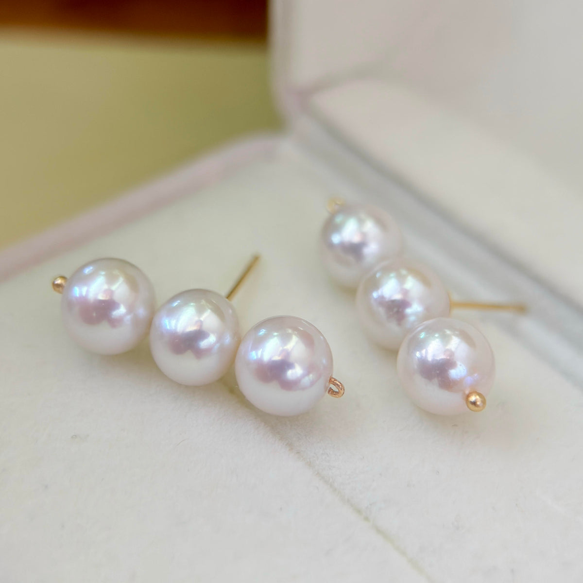 Balance Beam Pearl Stud Earrings – Three 8.5mm White Pearls with Pink Halo