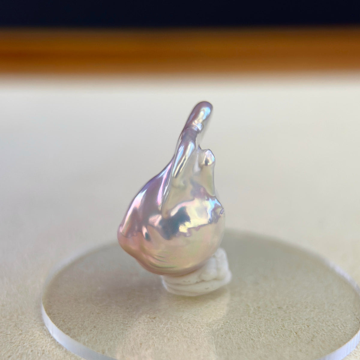 Mint green baroque pearl necklace pendant with an organic shape.