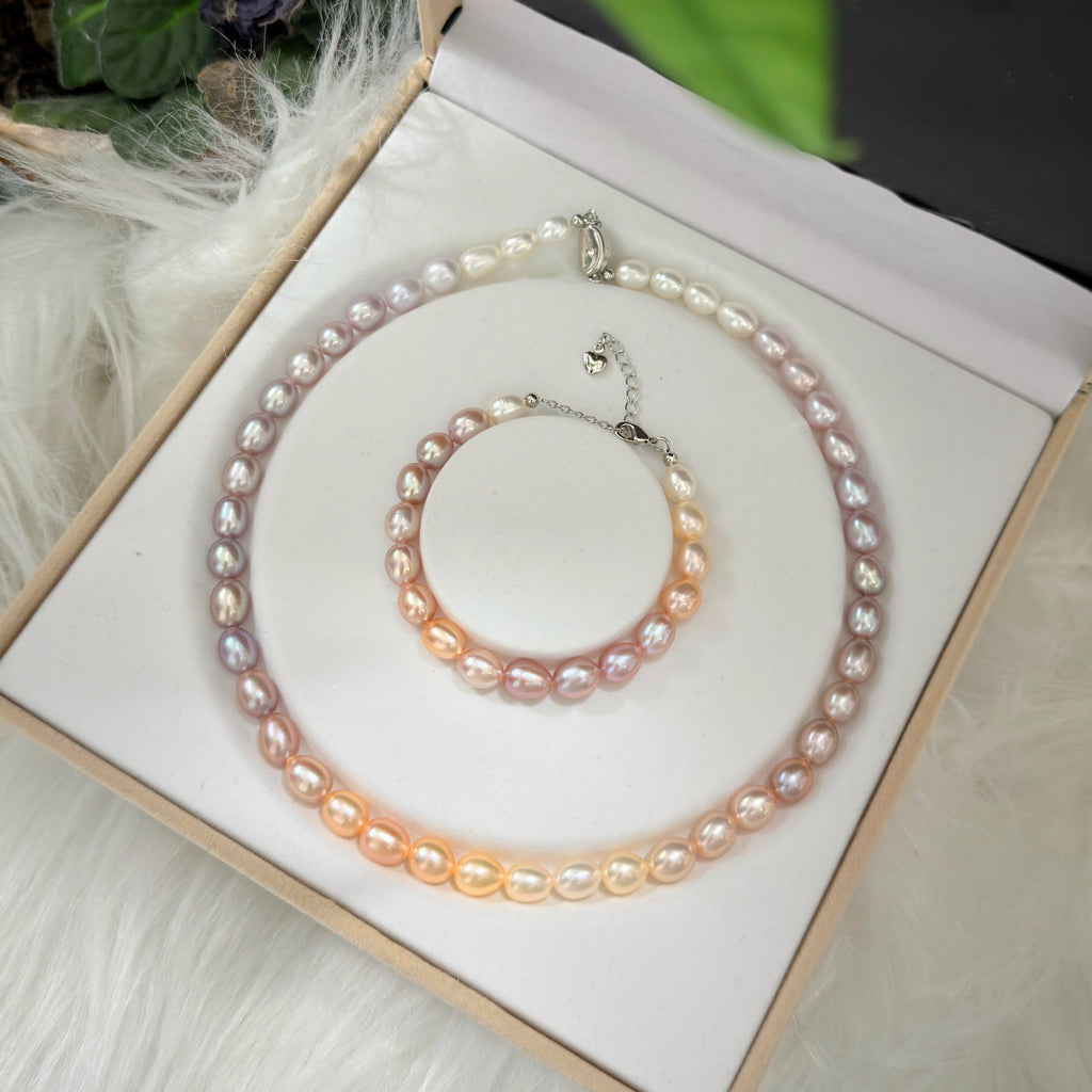 Close-up of the sterling silver clasp and pearl strand finishing.

