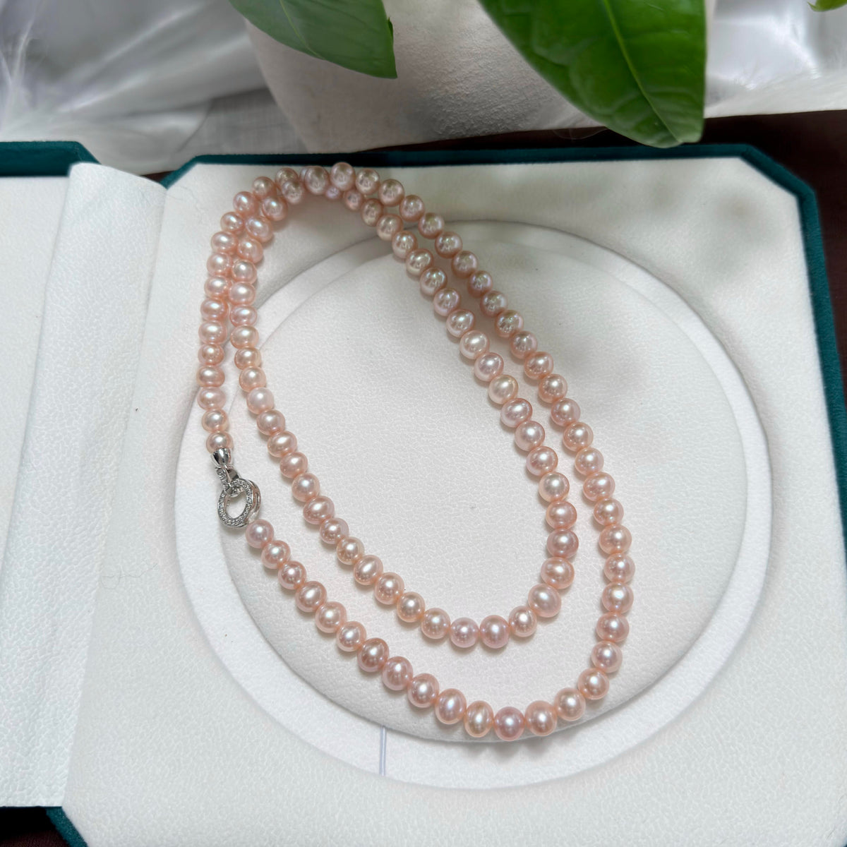 Long 90 cm pink-purple freshwater pearl necklace shown as a single elegant strand.