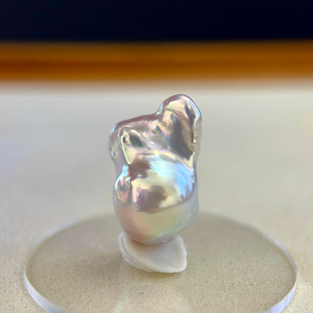 Delicate freshwater pearl pendant crafted in 925 sterling silver.